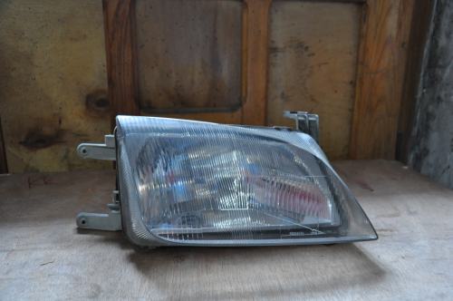 SUZUKI SWIFT MK4 96-04 PRAWY REFLEKTOR ORYGINAŁ