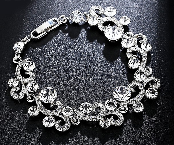 KOMPLET KOLCZYKI+ BRANSOLETKA, SREBRNY Z CYRKONIAM Zawartość kompletu Bransoletka Kolczyki