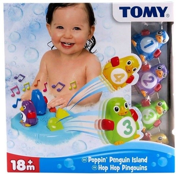 SKACZĄCE DO WODY PINGWINY PŁYWAJĄCE WYSPA TOMY