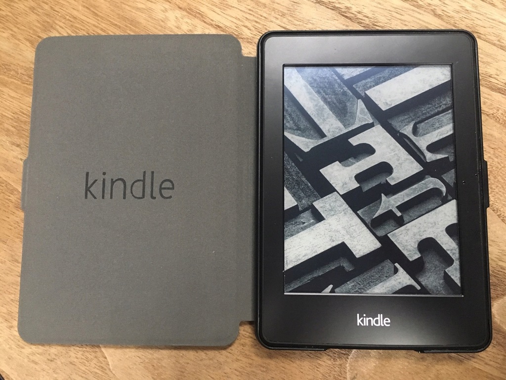 Kindle Paperwhite 2 + nowe etui + książki