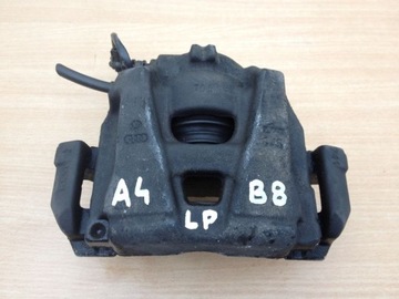 Audi a4 b8 супорт гальмівний лівий перед 2,0tdi фото №1