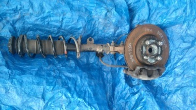 Nissan note e12 амортизационная стойка амортизатор перед левый фото №1