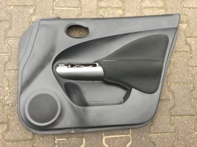 Nissan juke 2011- обшивка двері лівий перед фото №1