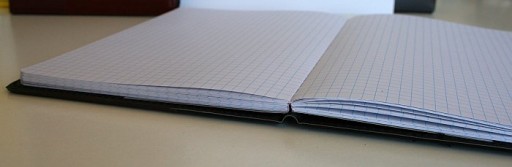 Блокнот формата А5 в кожаной обложке.