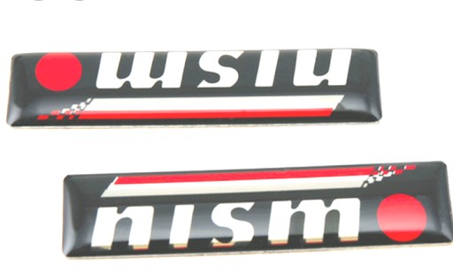 EMBLEMAT NAKLEJKA BŁOTNIKI ZNACZEK NISMO NISSAN 2x