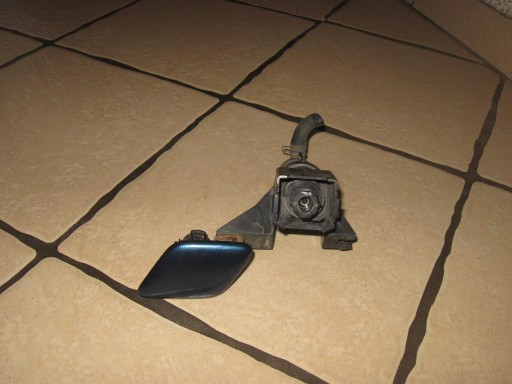 Mtsubishi OUTLANDER 01-06 Омивач лампи лівий