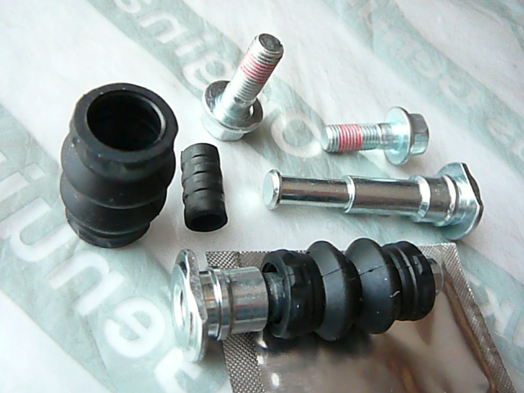 фото №3, Opel corsa c combo направляющие шарниры болты штифты суппорт тормоза перед